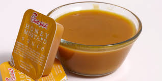 Chick-fil-A Honey Mustard Sauce dipping cup – ranked last in chick fil a sauces ranked