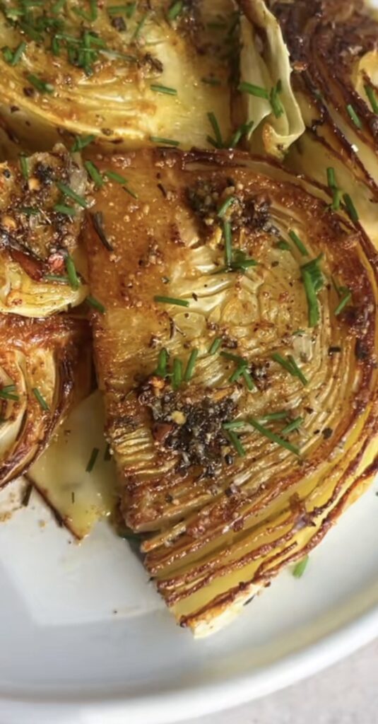 Blistered Cabbage Steak Recipe 1 blistered cabbage steak recipe with charred edges and lemon-tahini drizzle
