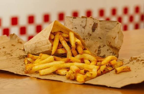 Five Guys vs In-N-Out: Which Premium Burger Is Actually Worth the Price? 4 Five Guys menu or receipt used in the price comparison with In-N-Out
