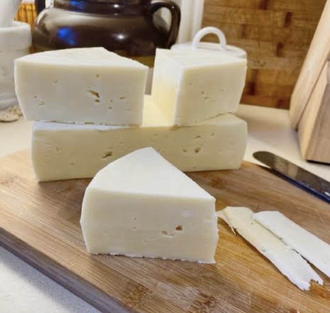 Butterkäse Cheese Recipes: 9 Ways to Cook With It 9 Block of butterkäse cheese on a cutting board