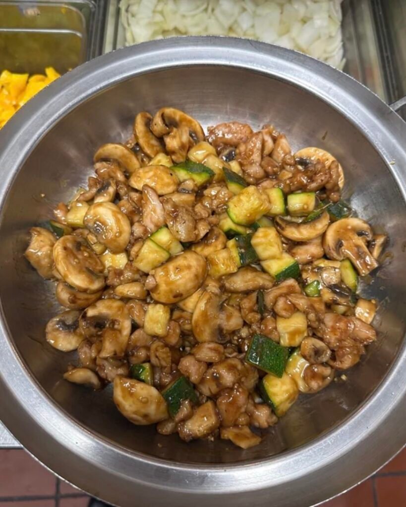 Panda Express Mushroom Chicken, wok-tossed with mushrooms and zucchini in ginger soy sauce
