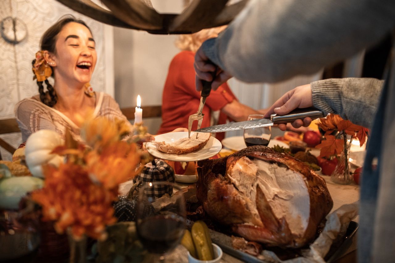 What a Real Thanksgiving Dinner for a Family of 4 Actually Costs This Year 7 Thanksgiving dinner spread set for a family of four