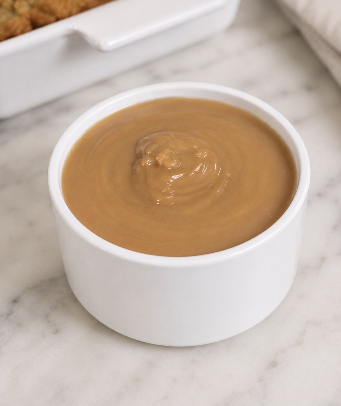 Turkey Gravy Recipe (Made From Real Pan Drippings, Plus a Make-Ahead Base) 2 Turkey gravy in a gravy boat, ready to serve