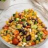 Greek chickpea bean salad with cucumber, tomato, red onion, kalamata olives, and feta