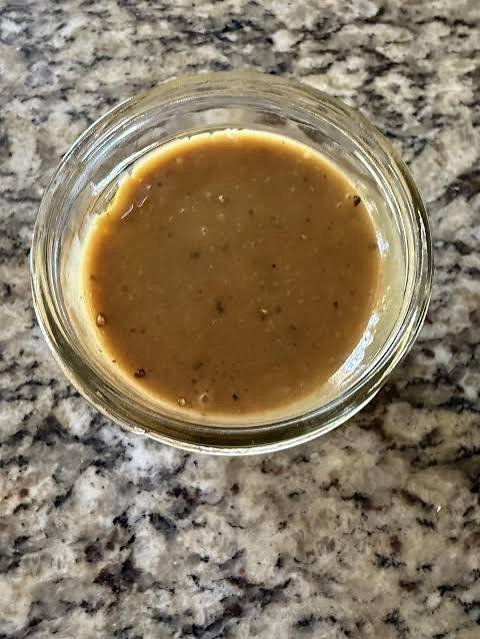 Homemade balsamic vinaigrette dressing in a jar