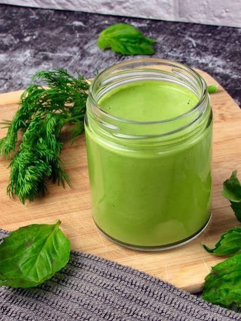 Homemade green goddess dressing in a jar