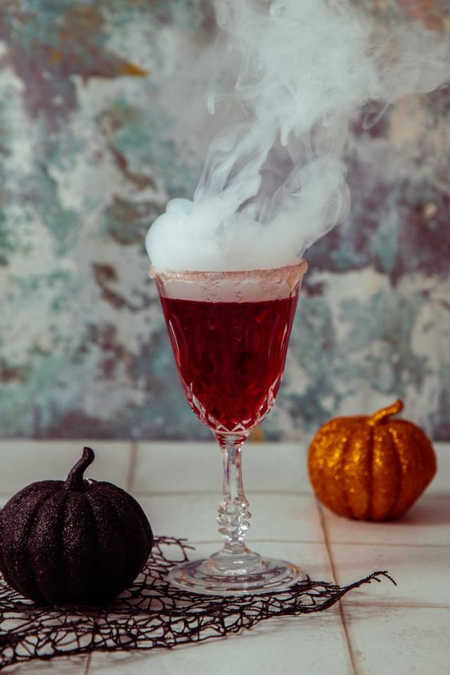 Halloween cocktails and mocktails spread for a spooky party