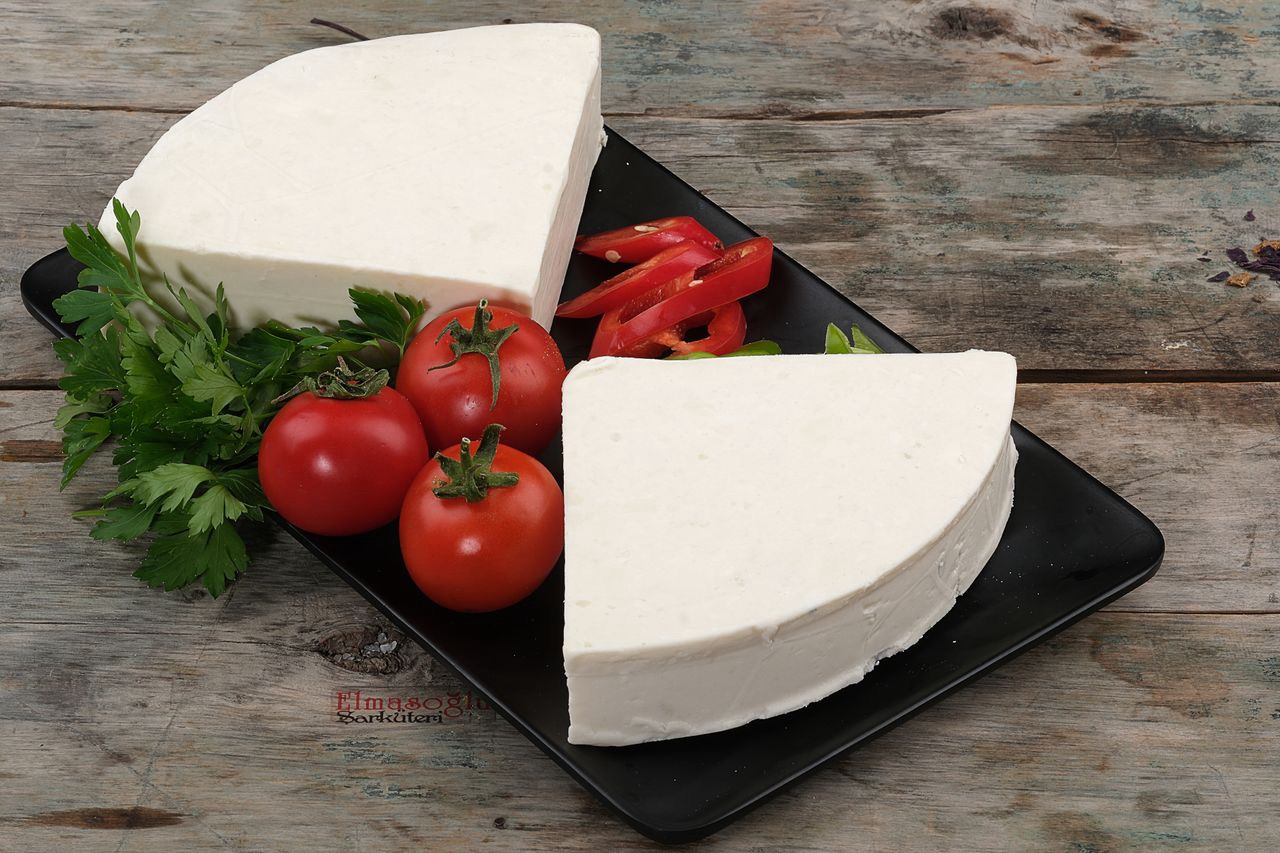 What Is Butterkäse Cheese? Pronunciation, Taste, and Where to Buy It 14 Block of butterkäse cheese sliced open showing its smooth, buttery texture