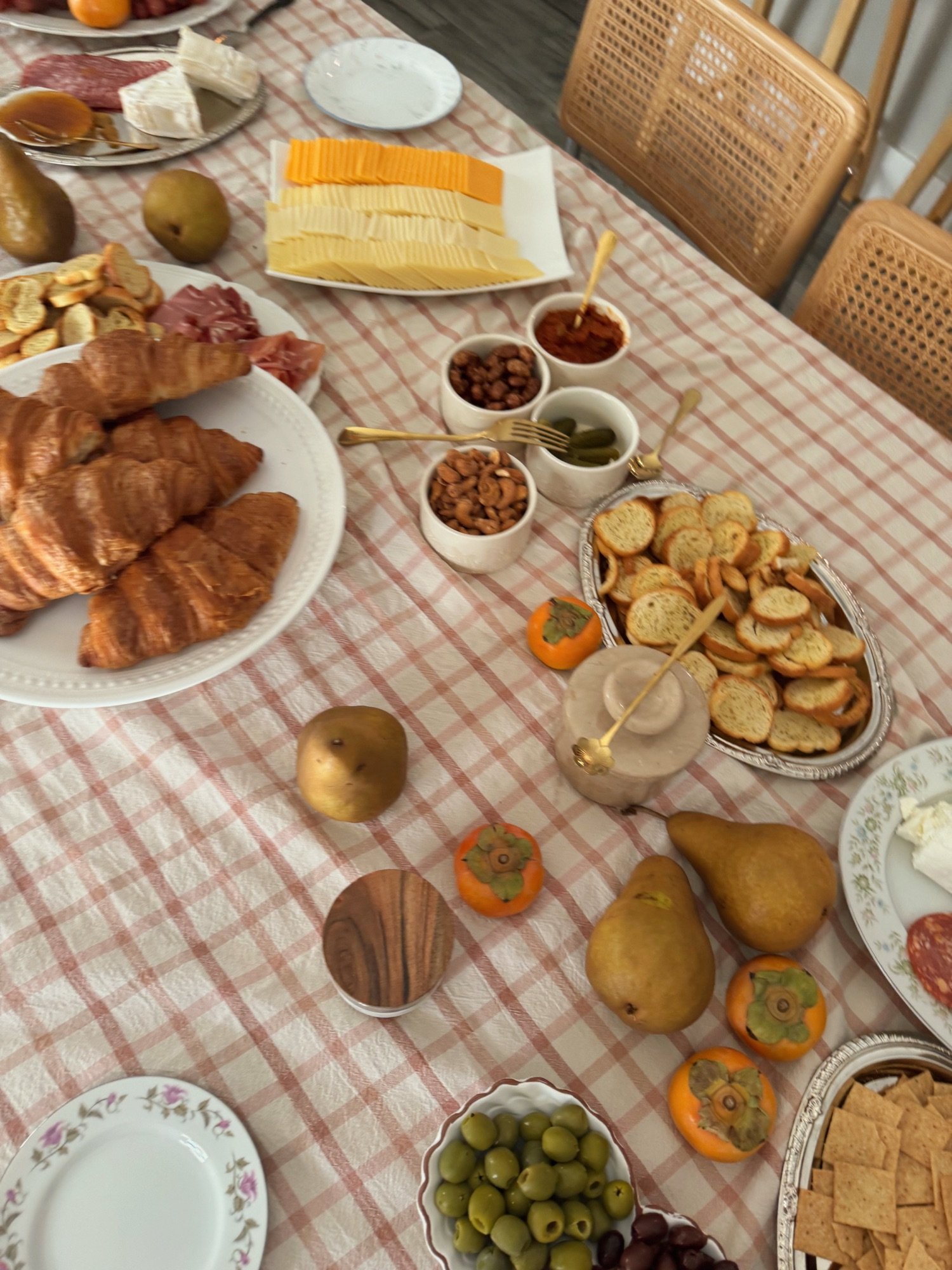 Thanksgiving side dish spread featuring creamed corn, candied yams, and cornbread dressing