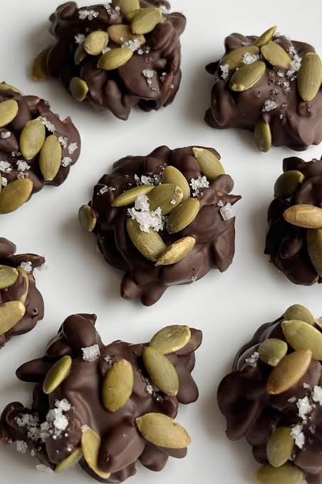 Dark chocolate pumpkin seed clusters with flaky sea salt